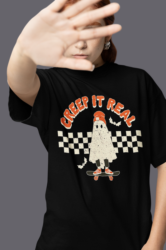 Creep It Real Ghost & Bats On A Skateboard T-shirt | Halloween Related, Boo Scary Vibes | 3 Colors - Unisex - seen on celebs